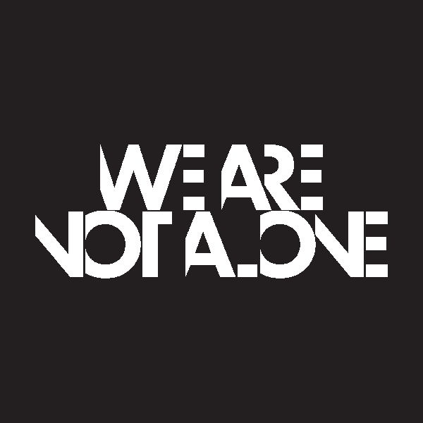 'We are not alone' in stylised sans-serif text on a dark background.